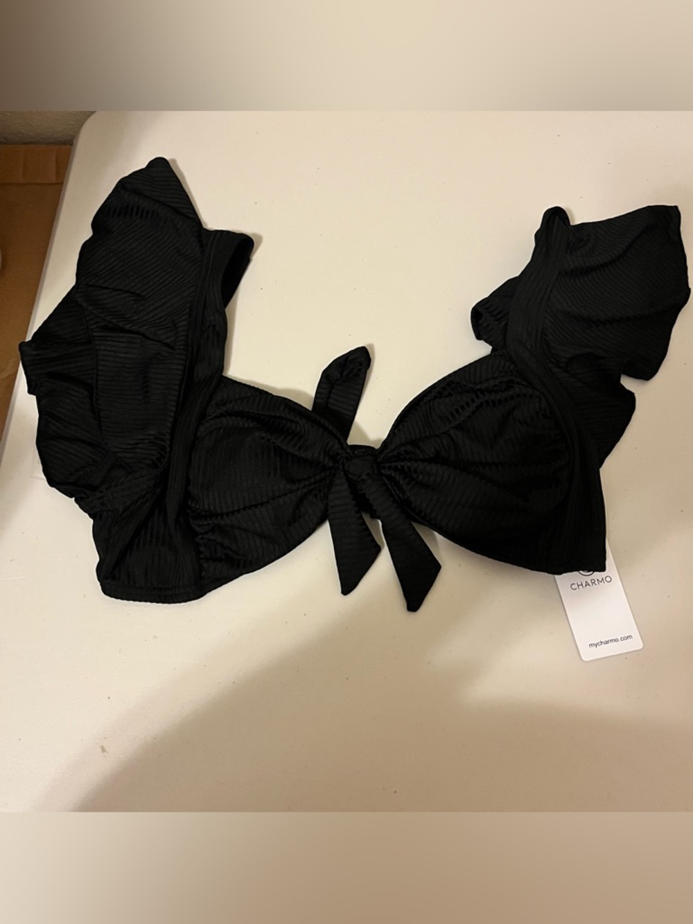 NWT - Charmo Ruffle Sleeve Ribbed Ruched Bikini Top in black. Size: Small